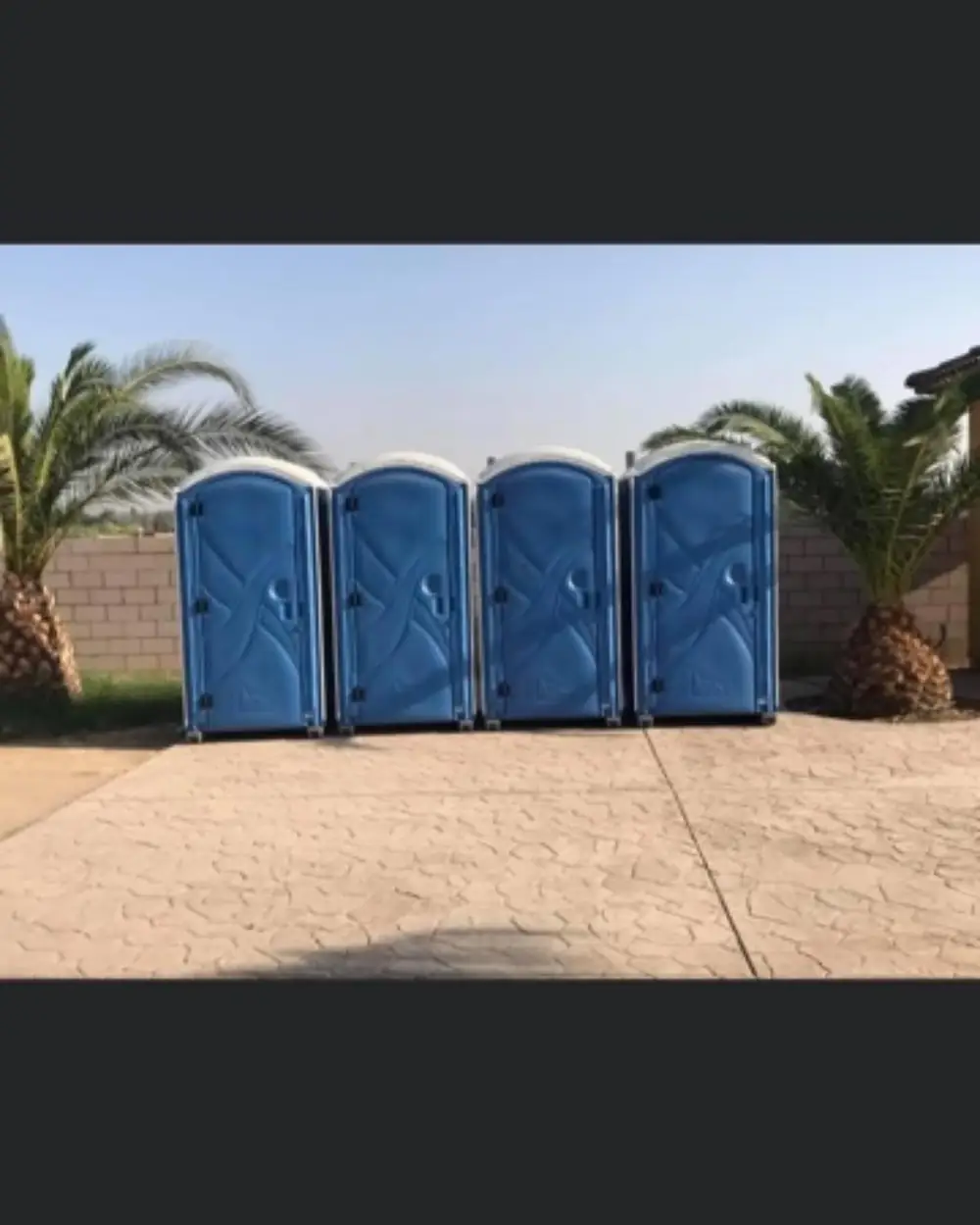 White single deluxe restroom cabin with a full-height door